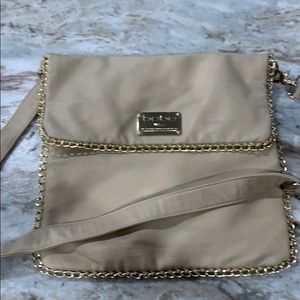 Bebe cream with gold trim bag